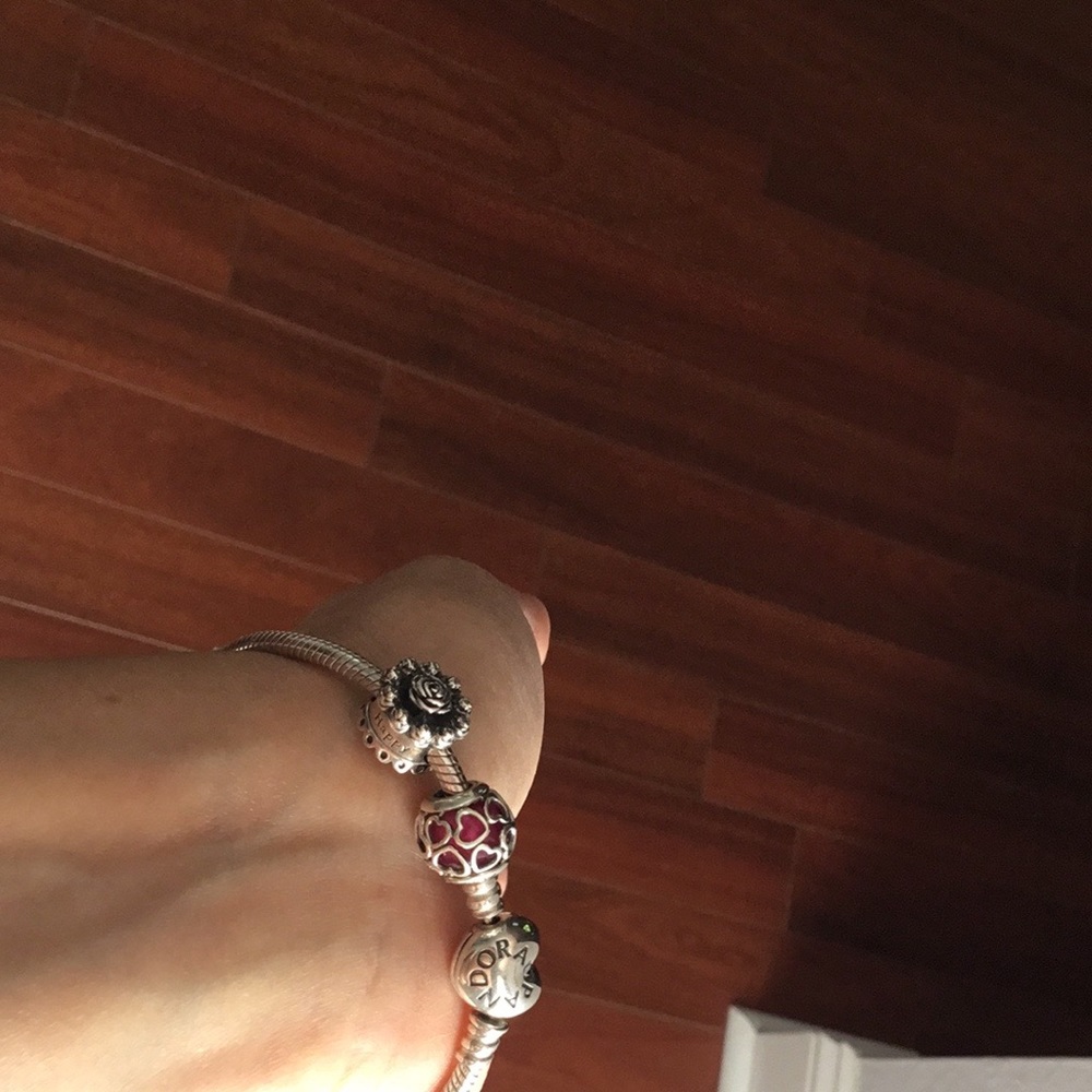 Pandora bracelet with birthday cake & heart charms